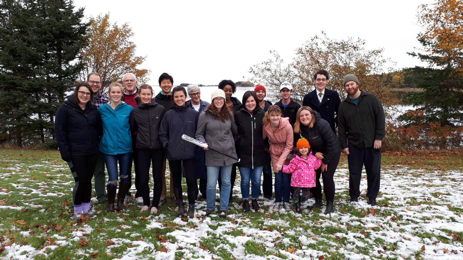 A group of people standing outside