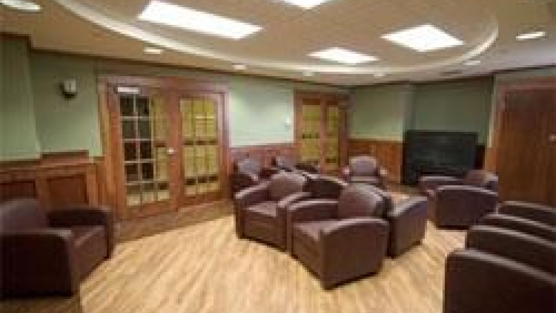 Lounge area with sofa chairs 