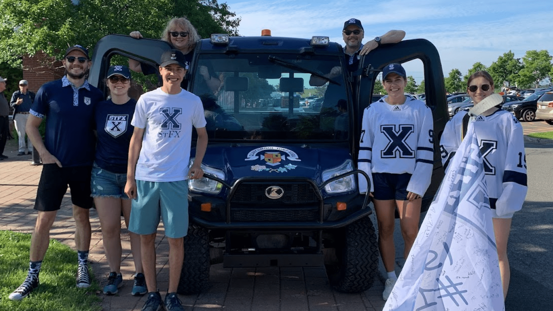 A group of people with a parade float
