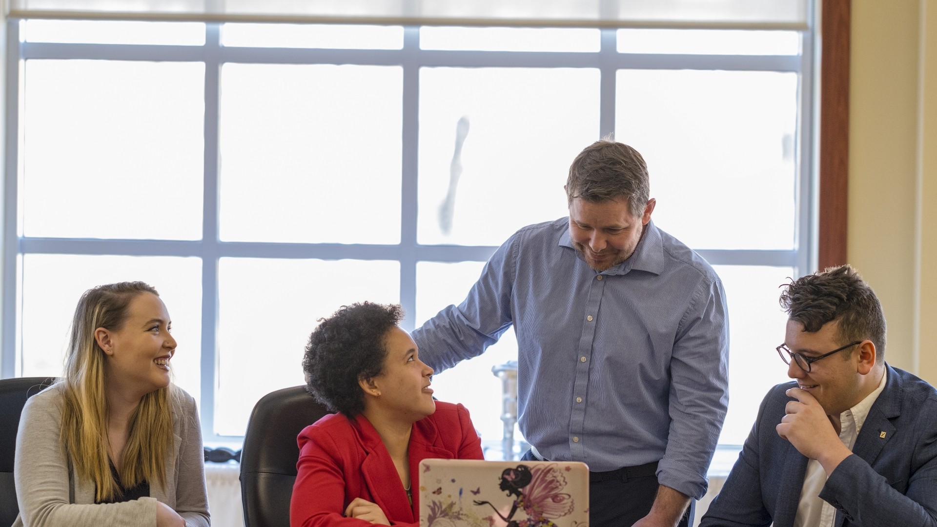 Students and Professor Dave Mattie in a Schwartz Meeting Room