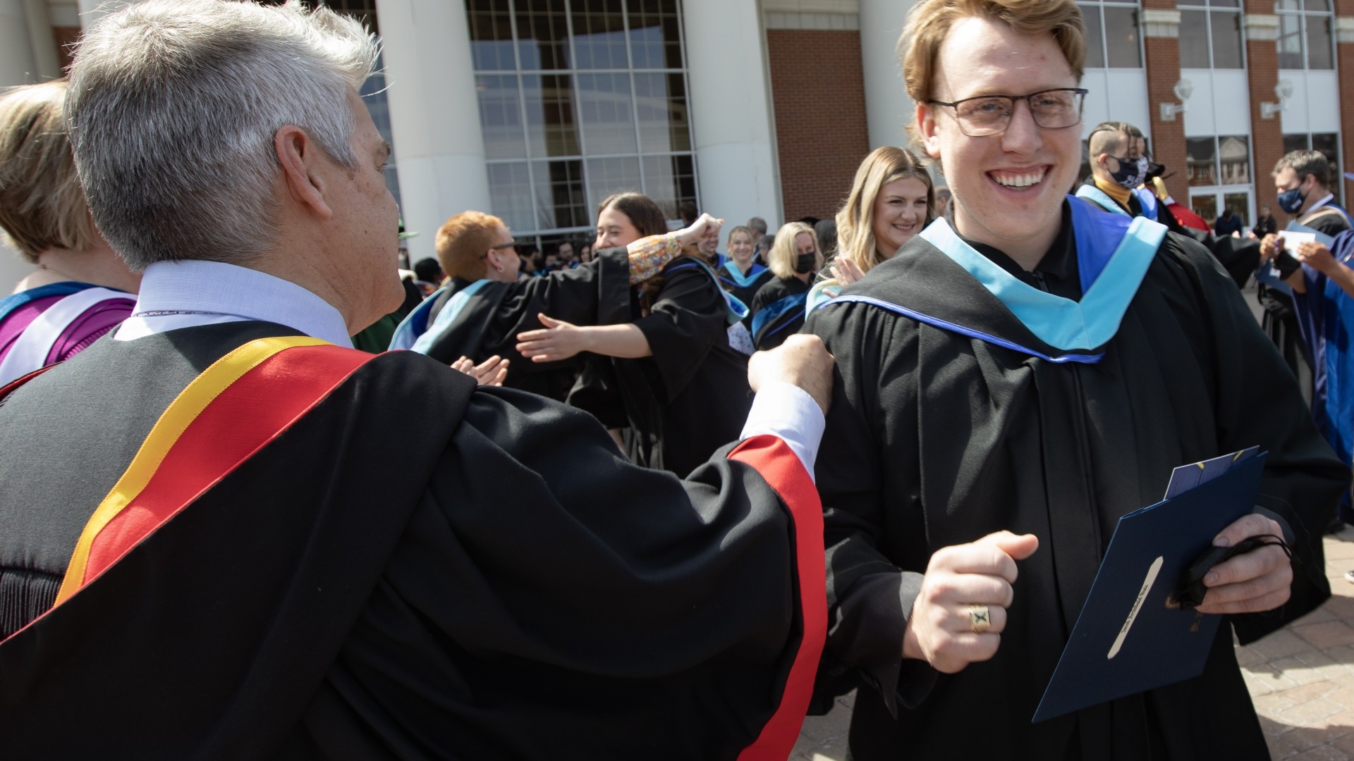 Graduates and faculty leaving the StFX Fall Convocation ceremony