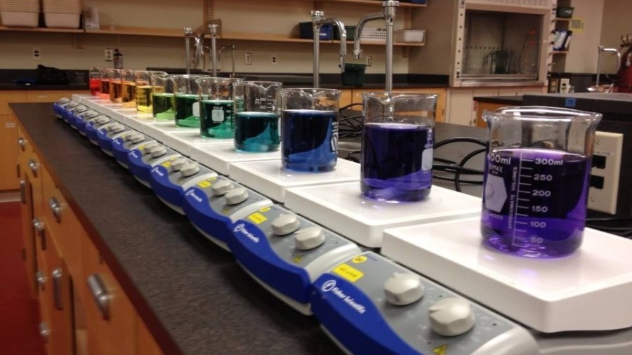 A row of laboratory equipment sitting on top of a counter