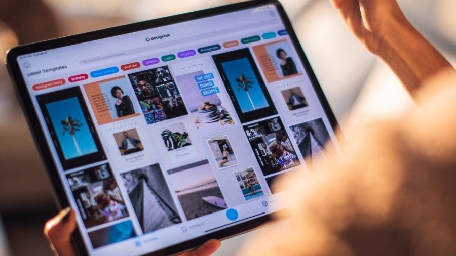 A marketer reviewing design templates