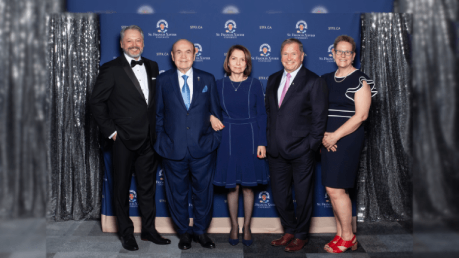 Five people standing together