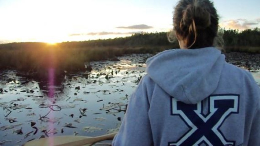 Picture of Student on Canoe in River