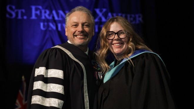 President and Vice-Chancellor, Dr. Andy Hakin and StFX graduate