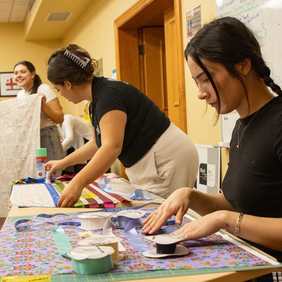 Students making Ribbon Skirts