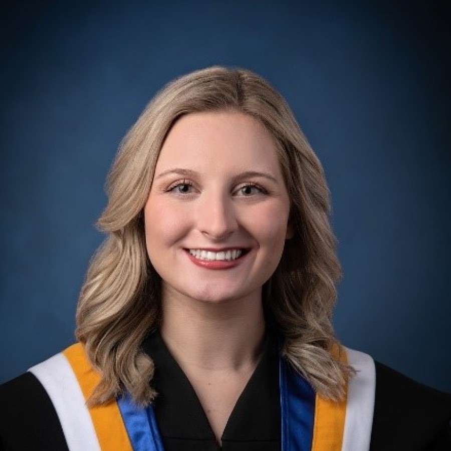 Graduation photo of blonde person