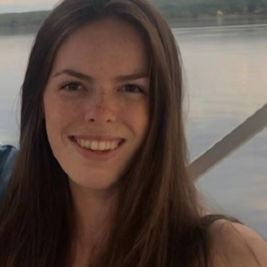 Headshot of a woman outdoors 