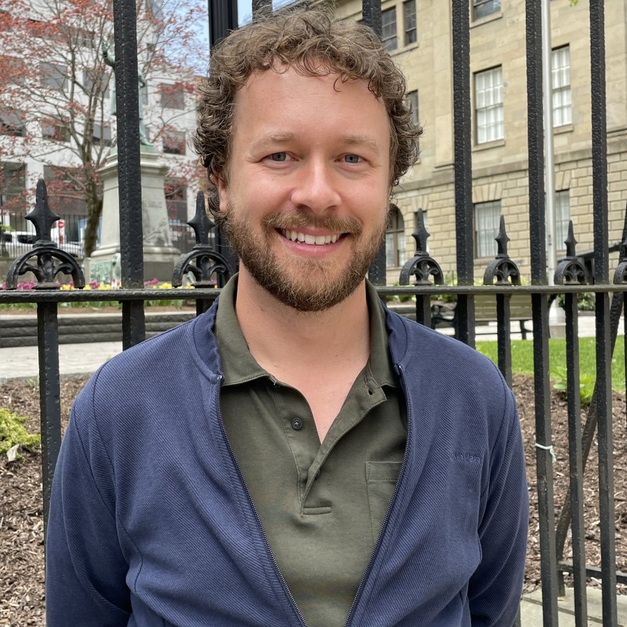 Headshot of a man outside