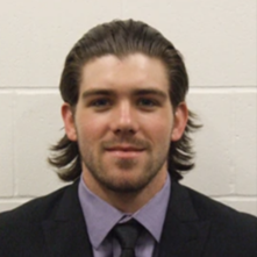 Headshot of student wearing a suit