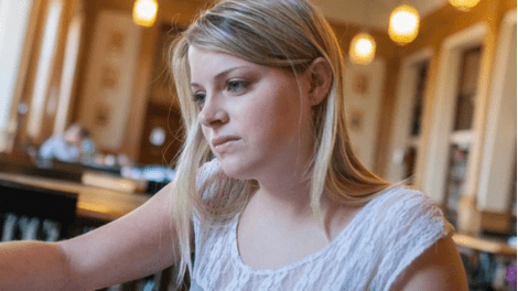A StFX business student studying in the library