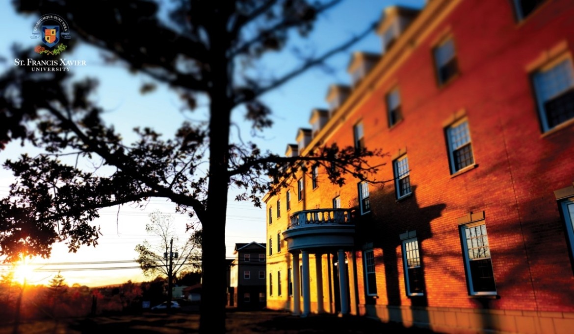 A building with a tree in front of it