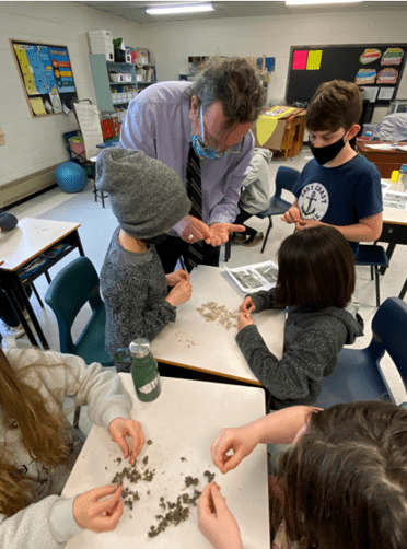Students at the Lab Observing and Manipulating Seed