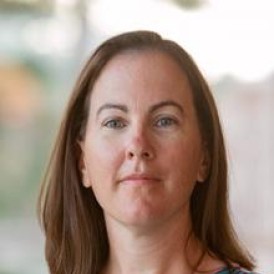 Headshot of woman smiling.
